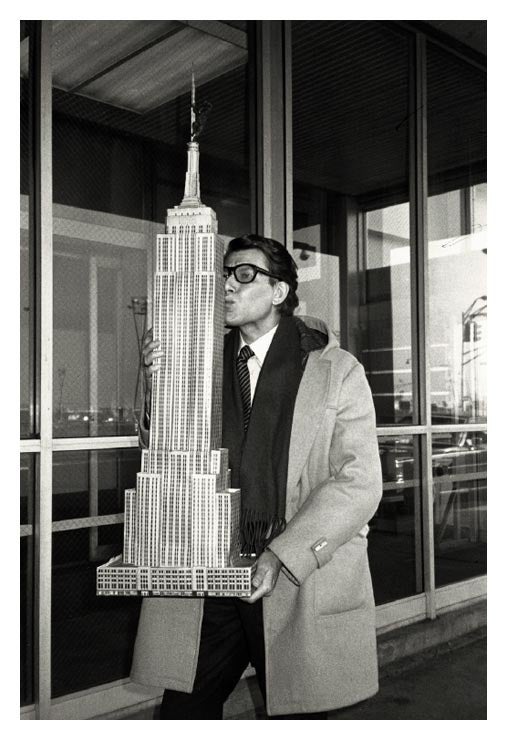 Yves St Laurent, NY 1983 - the designer kissing the empire state building