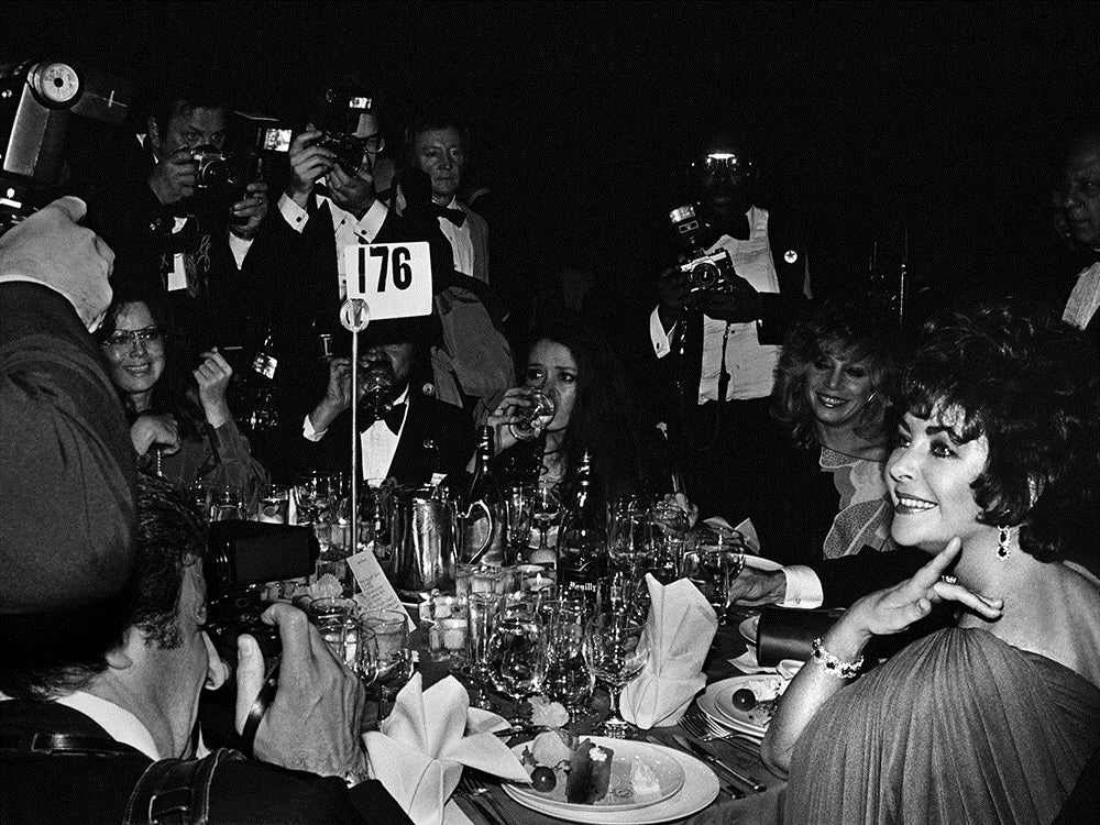 Liz Taylor and Paparazzi, Night of 100 Stars, NYC - Photograph by Roxanne Lowit