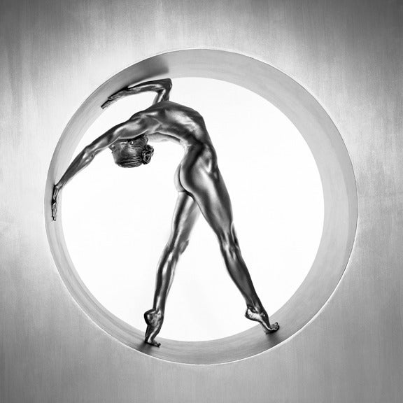 Guido Argentini Color Photograph - Heimarmene - A female dancer bending, painted silver, fine art photography, 1995