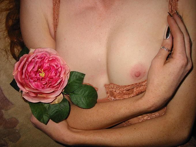 Celests Touch #4 - nude portrait of a woman with a flower in her hand