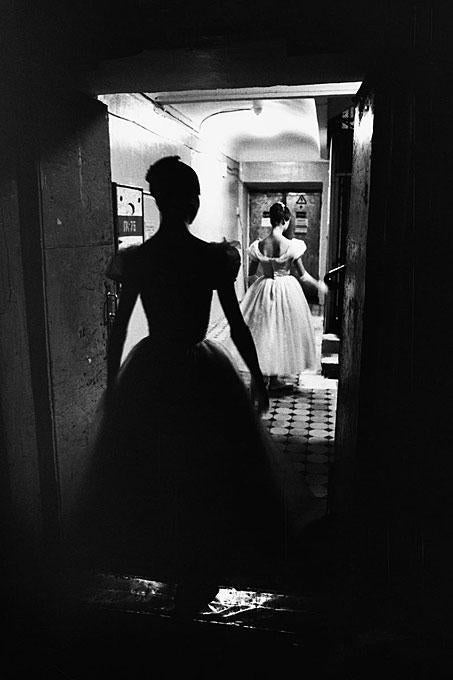 Gérard Uféras Still-Life Photograph - Bolshoi Theatre #1, Moscow, Russia - dancers behind the scenes standing in doors