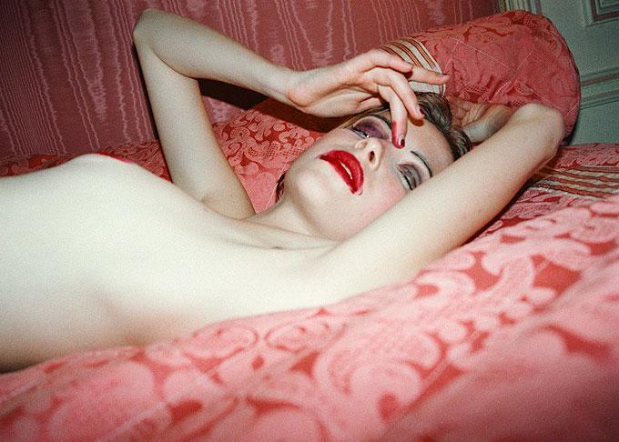 Michel Comte Color Photograph - Zora Nudes, Paris -model with red lips, lying on the bed nacked