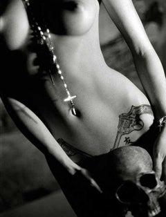 Mandy with Skull - provocative female nude portrait with religious symbols