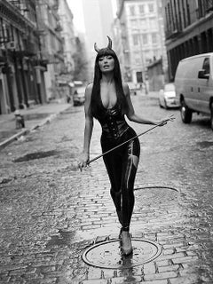 Sky Nellor, Crosby Street, NYC - dressed in leather with a whip in her hands