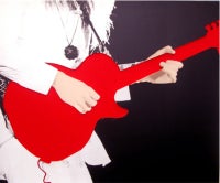 Person with Guitar (red)