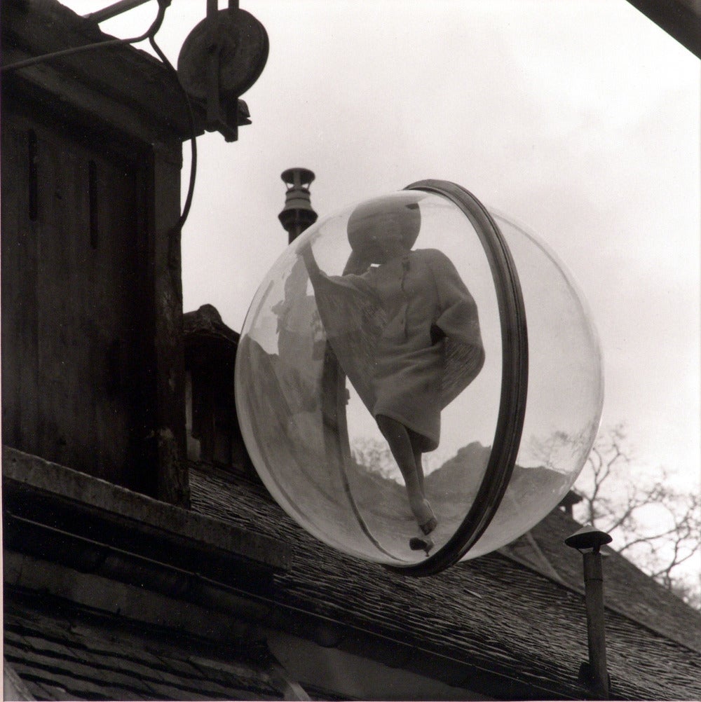 Melvin Sokolsky Figurative Photograph - Harper s Bazaar Bubble Spring Collection - On the Roof -