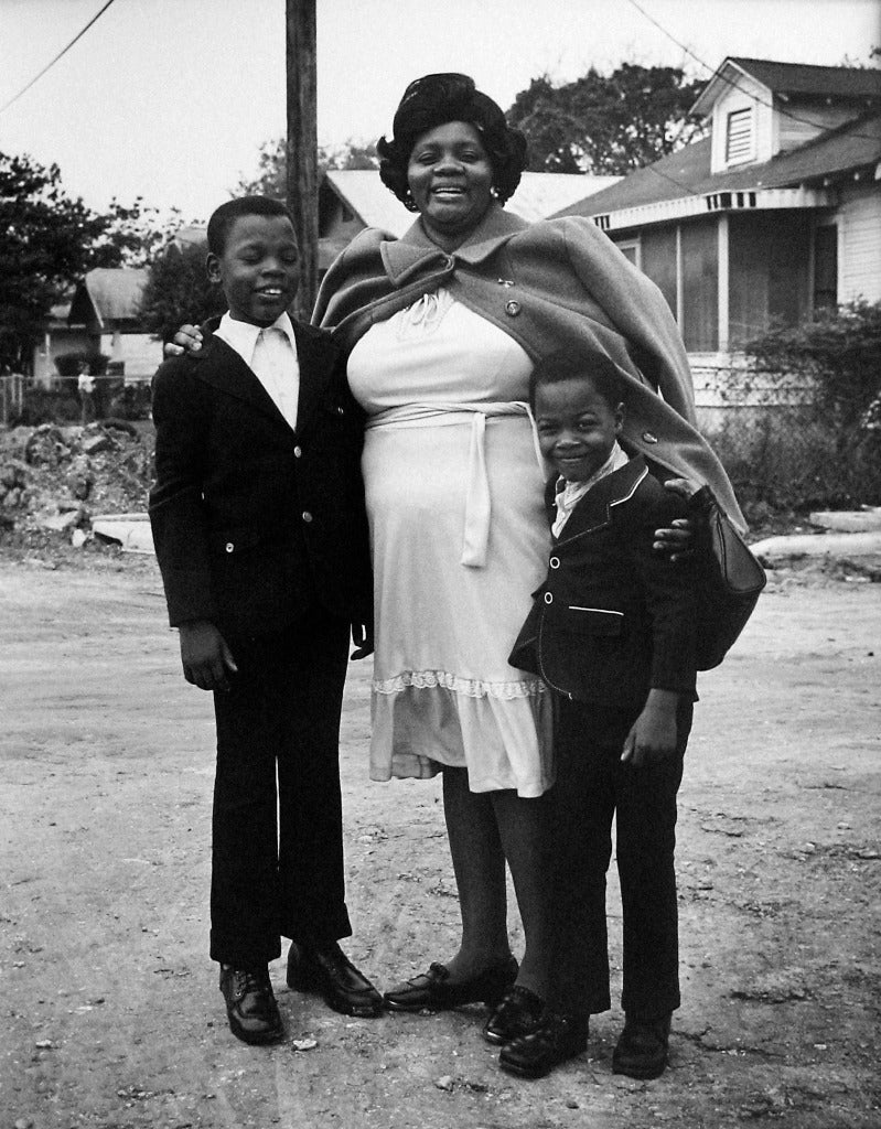 Earlie Hudnall Jr. Black and White Photograph - Mother with Sons, 3rd Ward, Houston, TX
