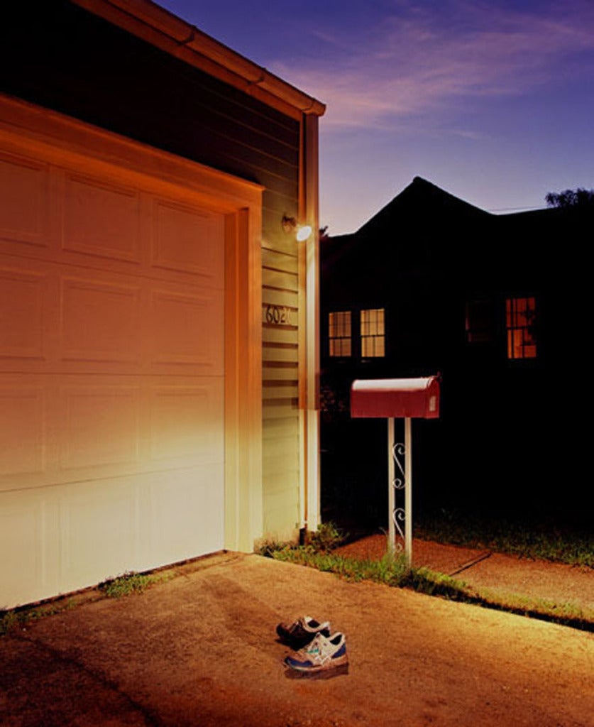William Greiner Figurative Photograph - Running Shoes in Driveway