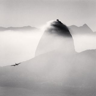 Michael Kenna Landscape Photograph - Plane and Sugar Loaf Mountain, Rio de Janeiro, Brazil