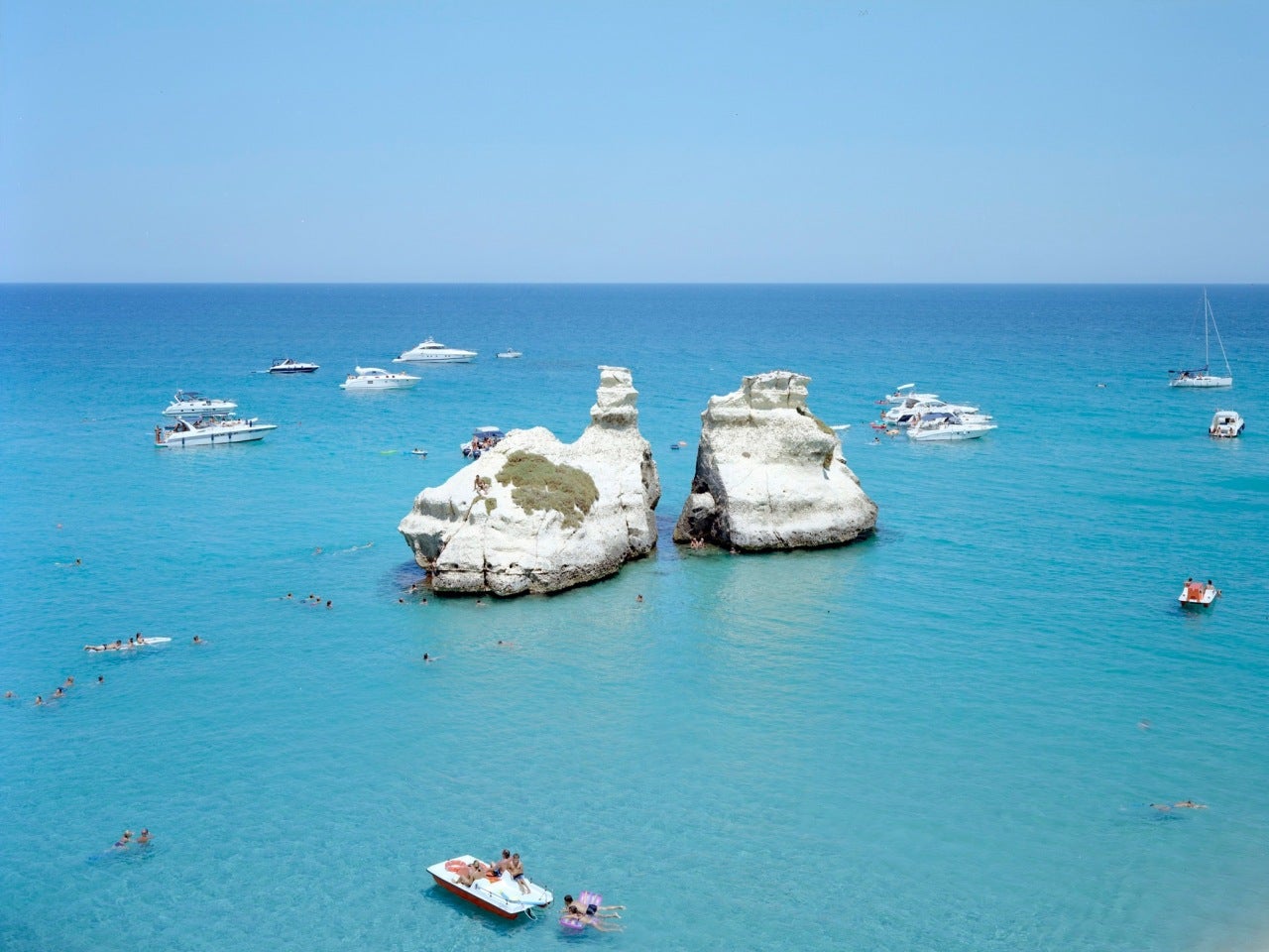 Massimo Vitali Landscape Photograph - Le Due Sorelle Motor Boats