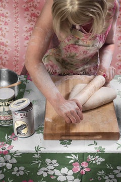 Secret Recipe: Contemporary Figurative Photograph of 1950's Housewife in Pink 
