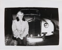 Andy Warhol in front of car