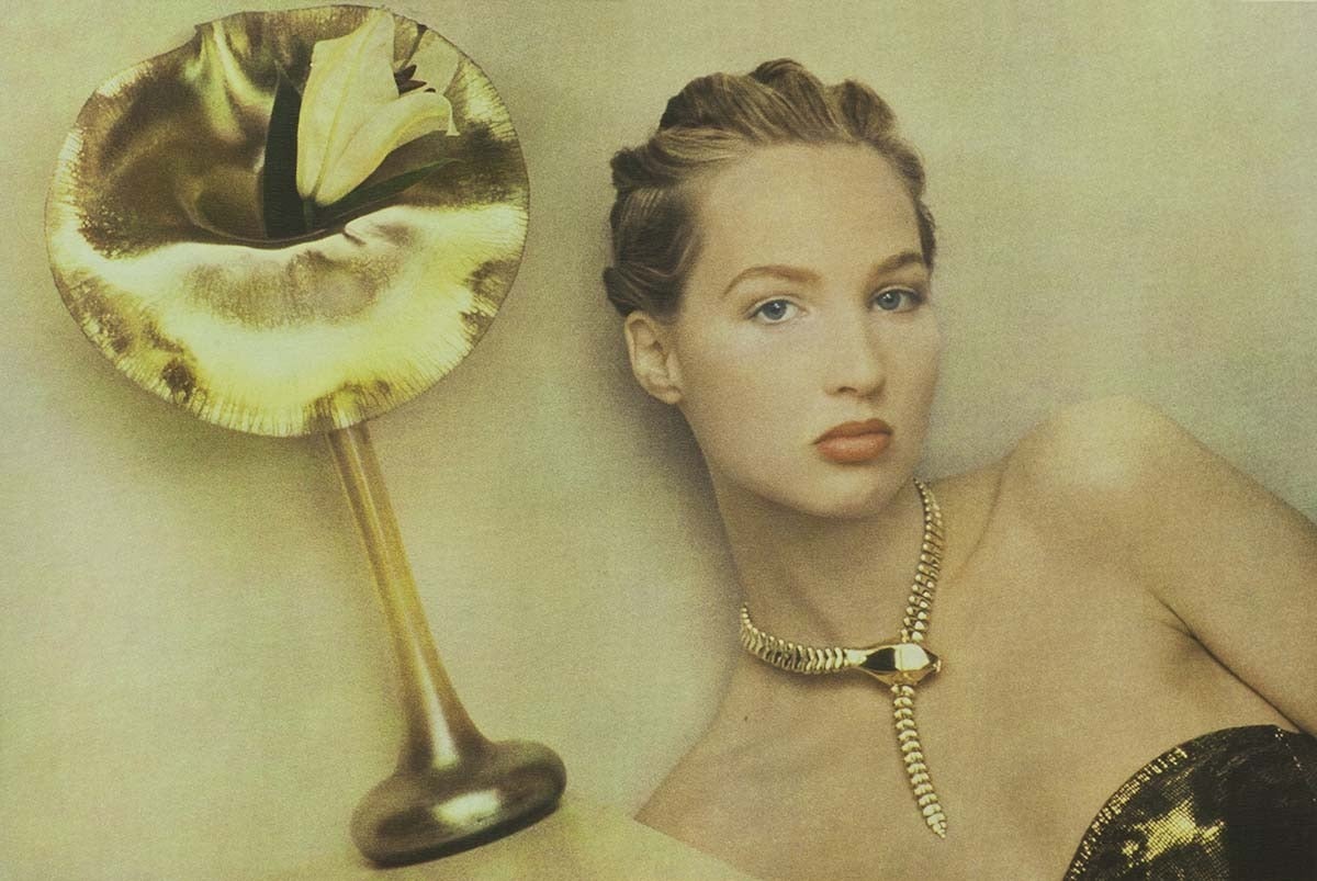 UNTITLED (YOUNG WOMAN IN GOLD WITH TRUMPET VASE) - Photograph by Sheila Metzner