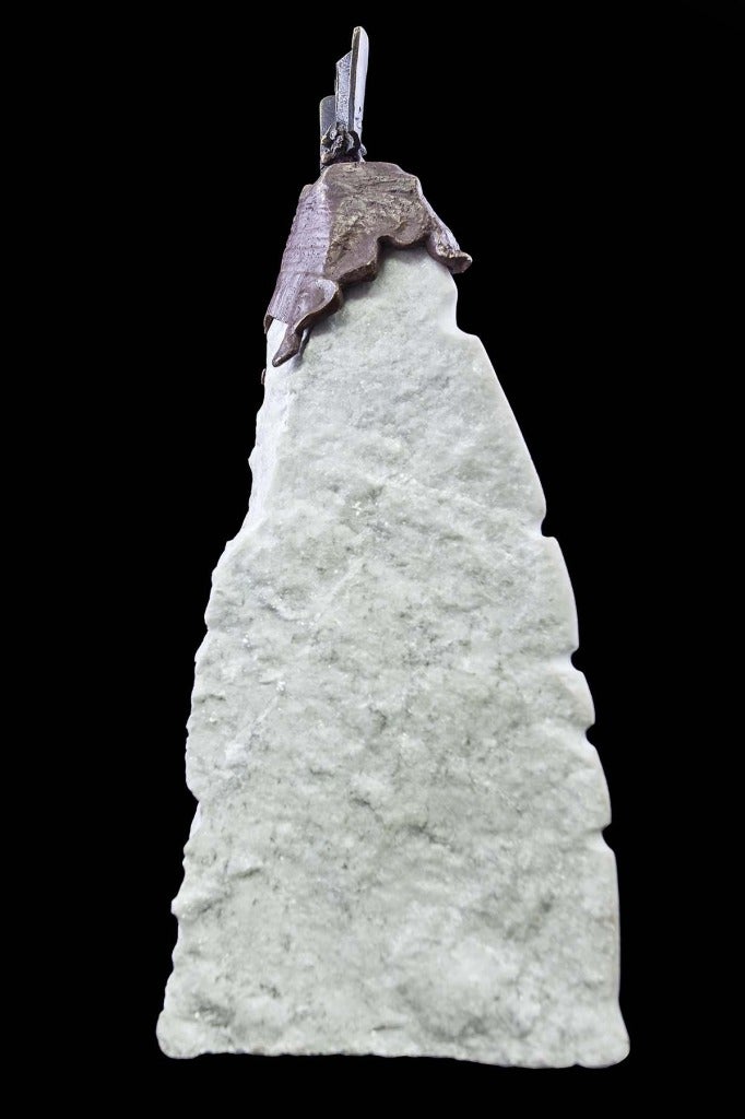 Abstract triangular Carrera marble sculpture with cast bronze top

Oscar Zamarripa was born in Guadalajara, Mexico in 1949.  He studied fine arts and sculpture at the University of Guadalajara.  In 1975, he received the Luis Echeverria Medal,