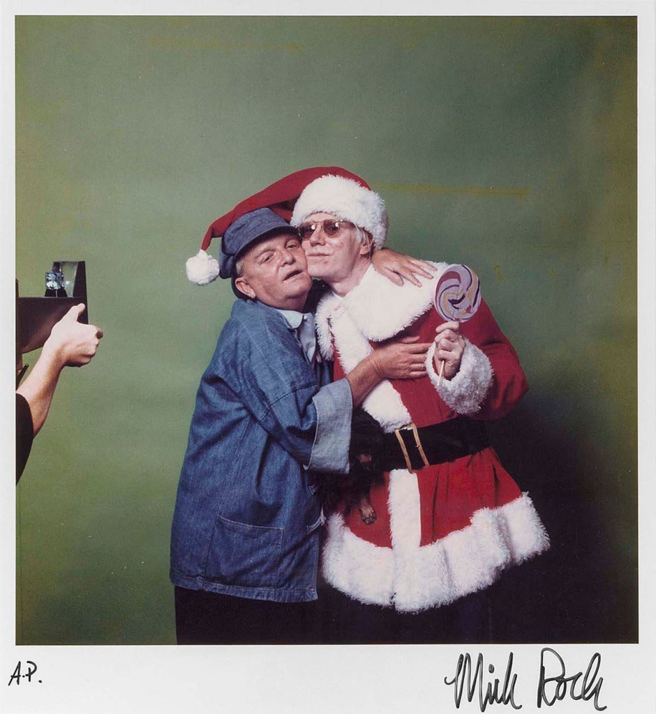 Mick Rock Color Photograph - ANDY WARHOL AS FATHER CHRISTMAS, EMBRACING TRUMAN CAPOTE