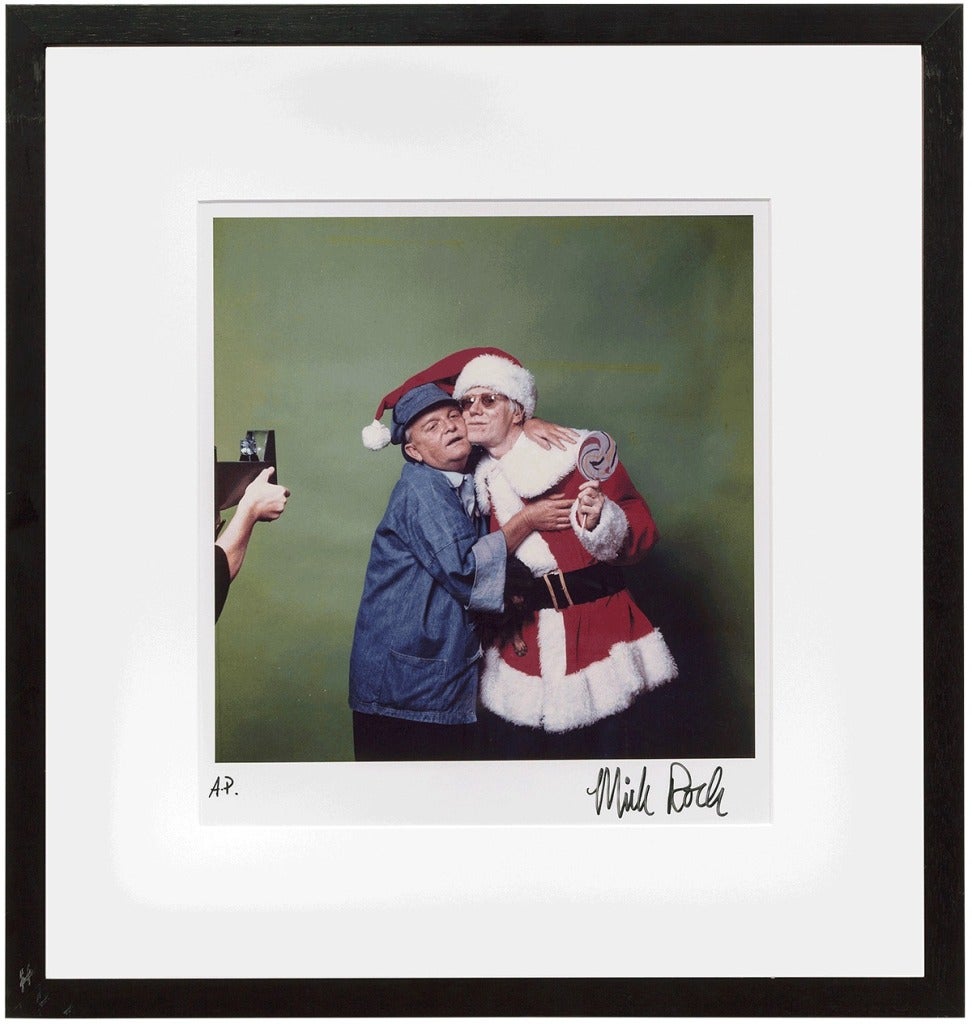ANDY WARHOL AS FATHER CHRISTMAS, EMBRACING TRUMAN CAPOTE - Photograph by Mick Rock