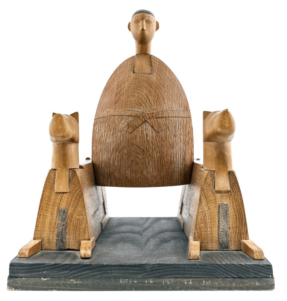 UNTITLED (WOODEN FIGURE WITH DOGS)