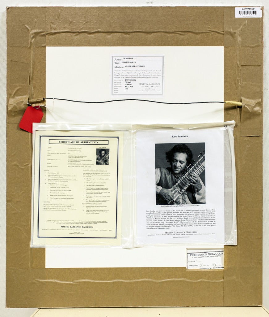 This photograph by Francesco Scavullo is a portrait of Ravi Shankar. 
The subject of this photograph, Ravi Shankar is a renowned master of the Indian sitar. He is considered one the world's greatest musicians and he is portrayed holding the musical