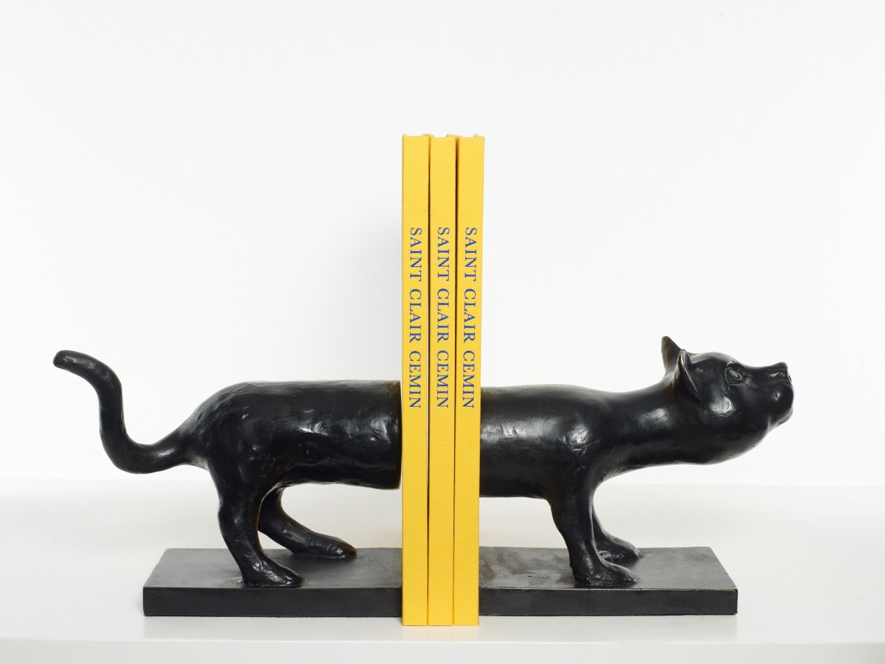 "A Very Long Chat,” a pair of exquisitely crafted bronze bookends, is Brazilian artist Saint Clair Cemin's latest edition. Shaped like a lithe cat, the whimsical yet functional creations will punctuate your favorite books. The edition remains true