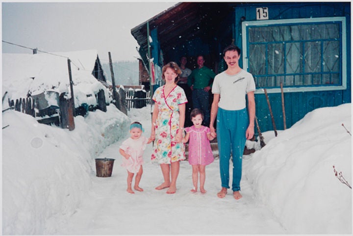 Pjotr and his family, Apanas, Siberia - Photograph by Bertien van Manen