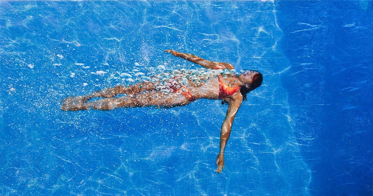 Eric Zener Color Photograph - EXHALATION IN BLUE, women in water, deep blue, light reflecting off pool, sunny