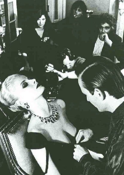 Helmut Newton Black and White Photograph - Woman Being Filmed Paris