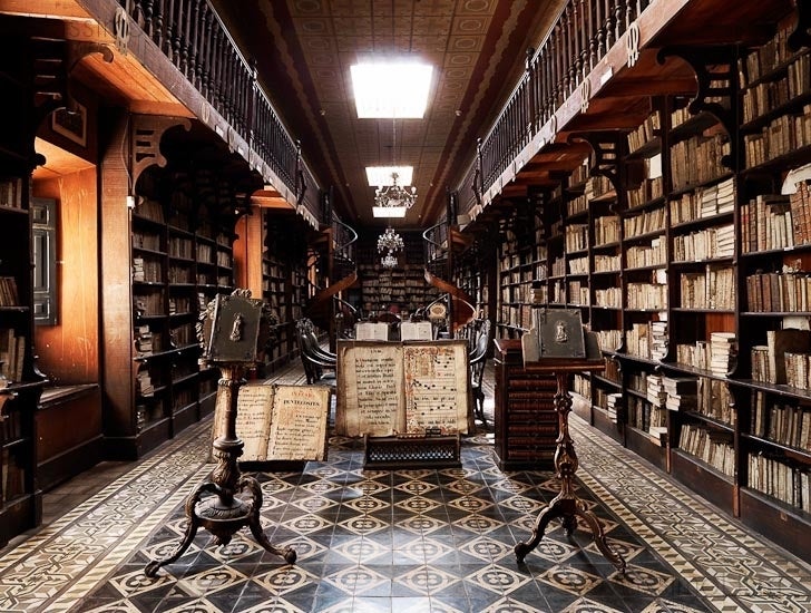 Massimo Listri Interior Print - Biblioteca S. Francisco, Lima