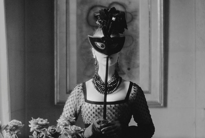 Mark Shaw Figurative Photograph - Dior, St. Laurent's Mask with "Lola" Dress