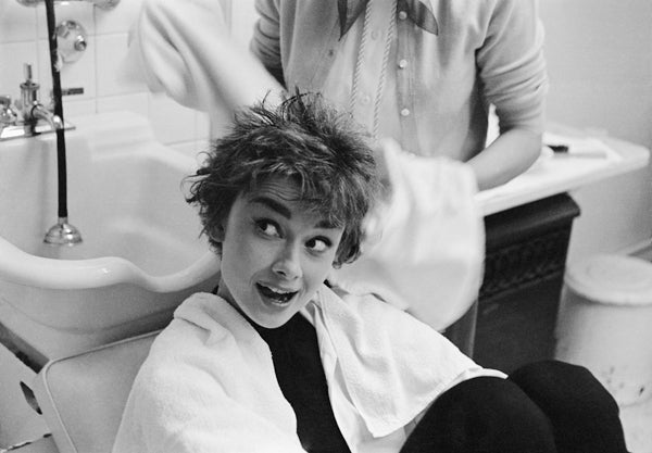 Mark Shaw Black and White Photograph - Audrey Hepburn After Being Shampooed On The Set Of Sabrina