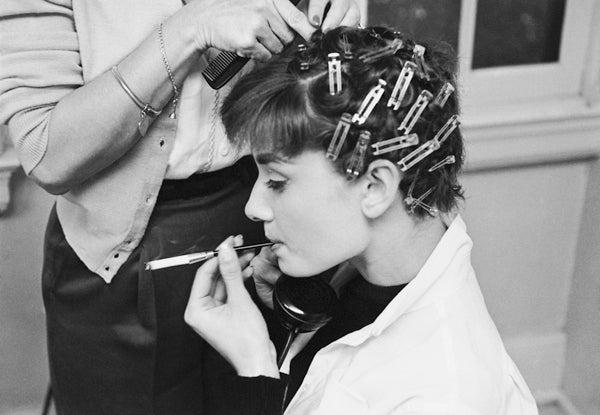 Mark Shaw Black and White Photograph - Audrey Hepburn Getting Her Hair Curled
