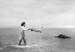 Jacqueline Kennedy Swings Caroline In The Water At Hyannis Port, Massachusetts