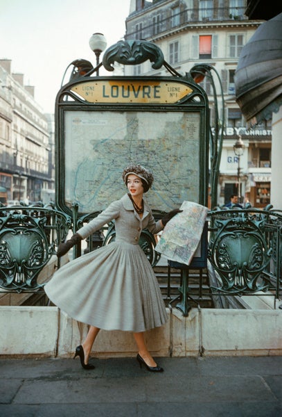 Mark Shaw Figurative Photograph - Grey Dior Outside Paris Louvre Metro