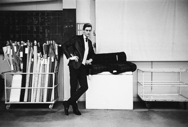 Mark Shaw Portrait Photograph - Yves St. Laurent in His Studio