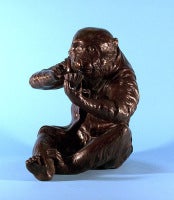 Monkey Seated with Honeycomb