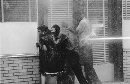 Charles Moore Black and White Photograph - Alabama Fire Department Aims High-Pressure Water Hoses at Civil Rights Demonstrators, Birmingham Protests, May 1963