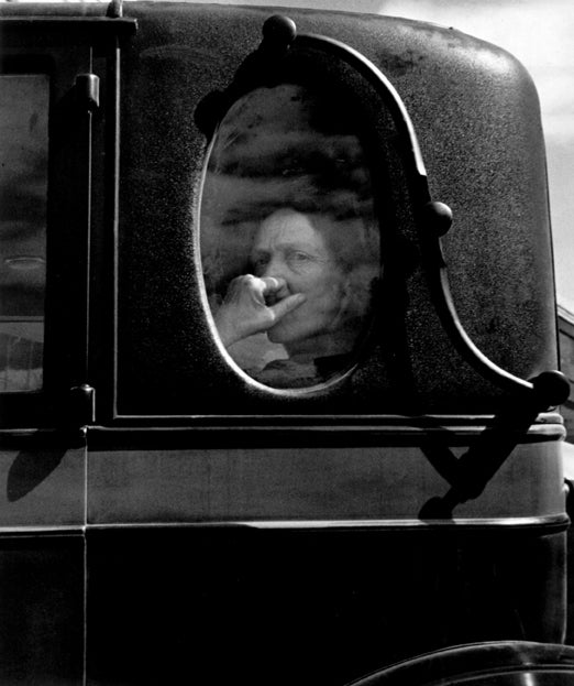 Dorothea Lange Black and White Photograph - Funeral Cortege, End of an Era in a Small Valley Town, 1938