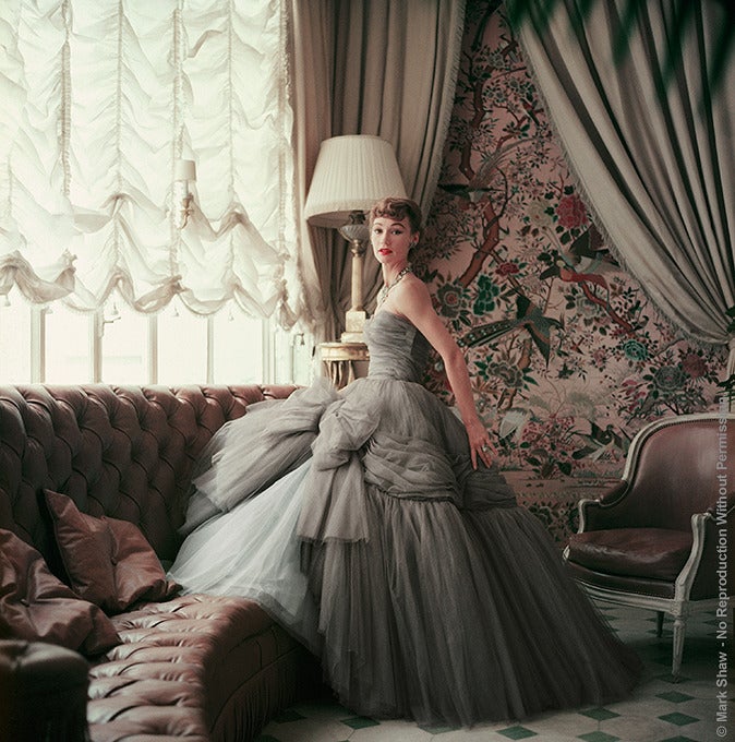 Mark Shaw Portrait Photograph - Sophie Malgat Wears Dior in Dior's Passy Home, Paris, 1953