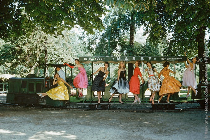 Mark Shaw Color Photograph - Models on Train, Bois de Boulogne, Paris, 1957