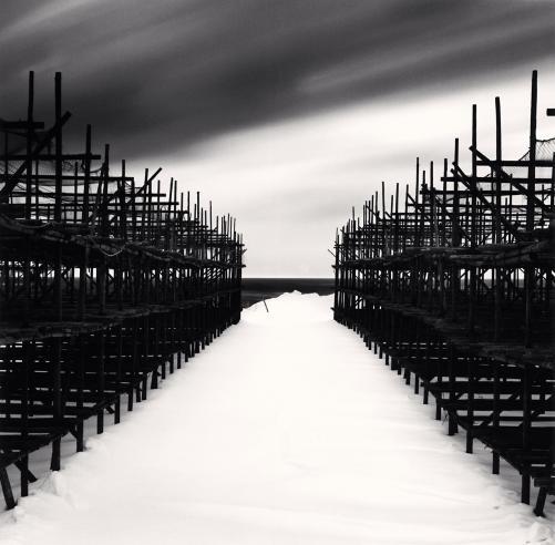 Michael Kenna Black and White Photograph - Fish Drying Racks Wakkanai, Hokkaido, Japan. 2004