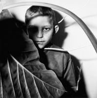 Roger Ballen - Study of Boy and Plant, 1999 Study of Boy and Plant, 1999