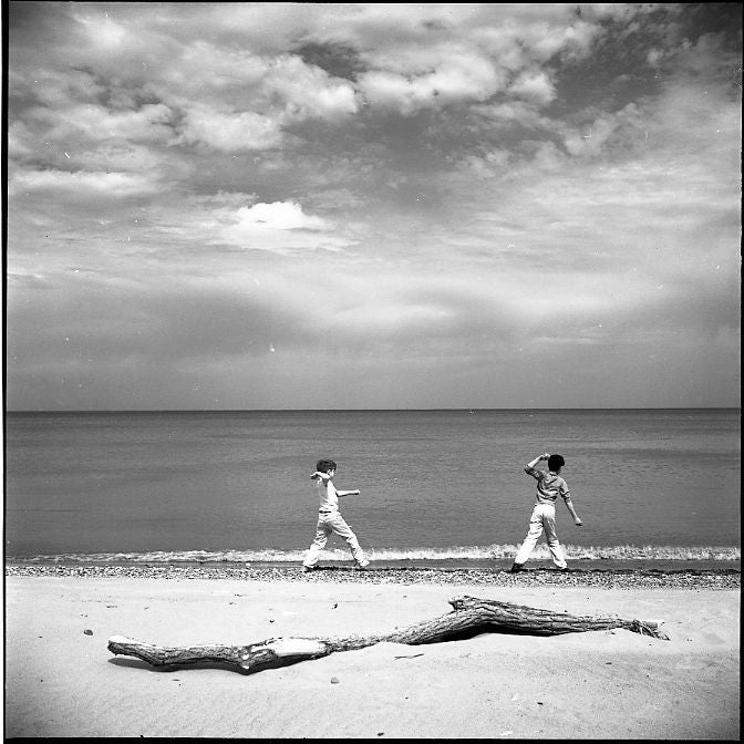 Vivian Maier Portrait Photograph - Untitled (two boys on beach), 1965