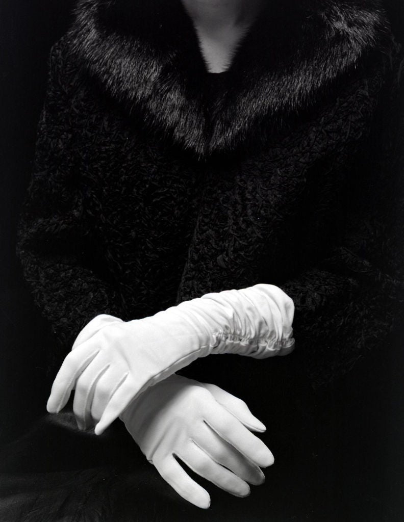 Janet Russek Black and White Photograph - Crossed Arms with Gloves