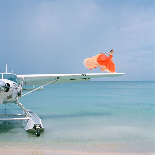 Rodney Smith Color Photograph - Saori on Sea Plane Wing, Dominican Republic, 2010