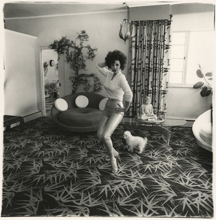Diane Arbus Portrait Photograph - Blaze Starr in her living room, Baltimore, M.D., 1964