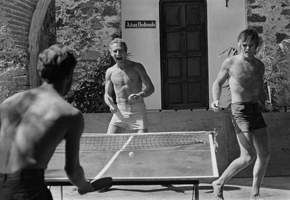 Lawrence Schiller Black and White Photograph - Paul Newman and Robert Redford (ping pong), Mexico, 1968