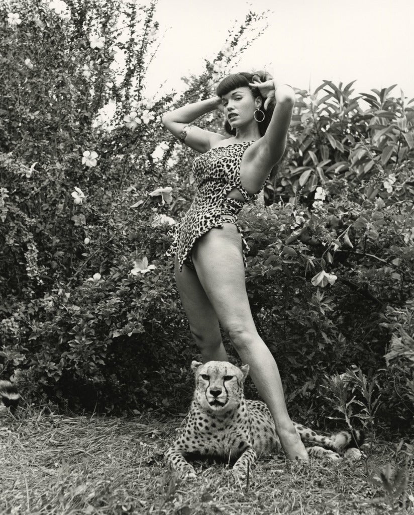 Bunny Yeager Black and White Photograph - Bettie Page in Leopard-Skin Suit with Cheetah, 1954