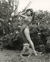 Bettie Page in Leopard-Skin Suit with Cheetah, 1954