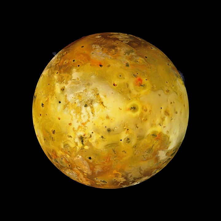 Michael Benson Color Photograph - Volcanic Io with Two Eruptions Visible, Galileo, July 3, 1999,