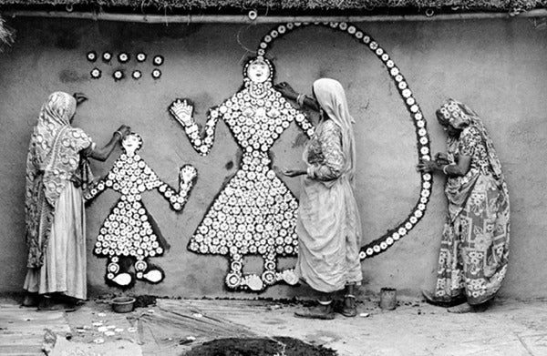 Jyoti Bhatt Black and White Photograph - Women making a Samha Devi image, Haryana
