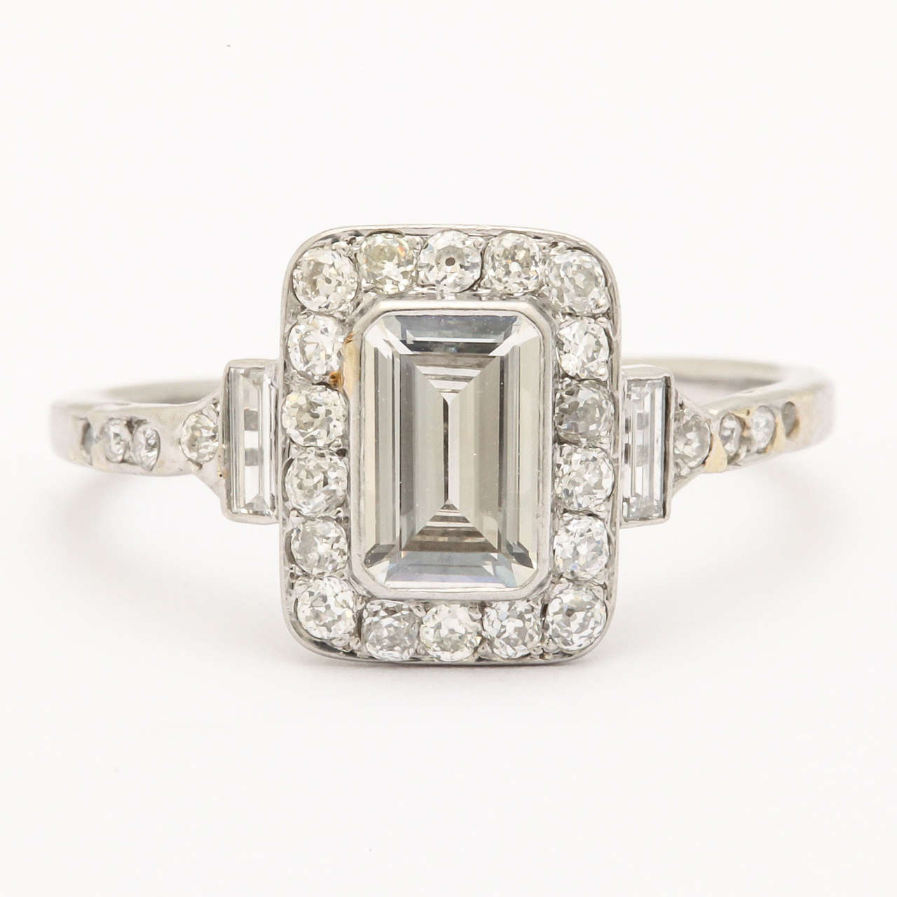 Contemporary Emerald Cut Diamond Platinum Ring For Sale